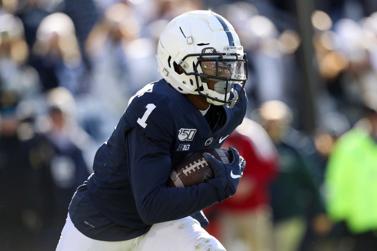 Penn State Nittany Lions wide receiver KJ Hamler (1) runs with the ball on a punt return during the first quarter against the Indiana Hoosiers at Beaver Stadium.