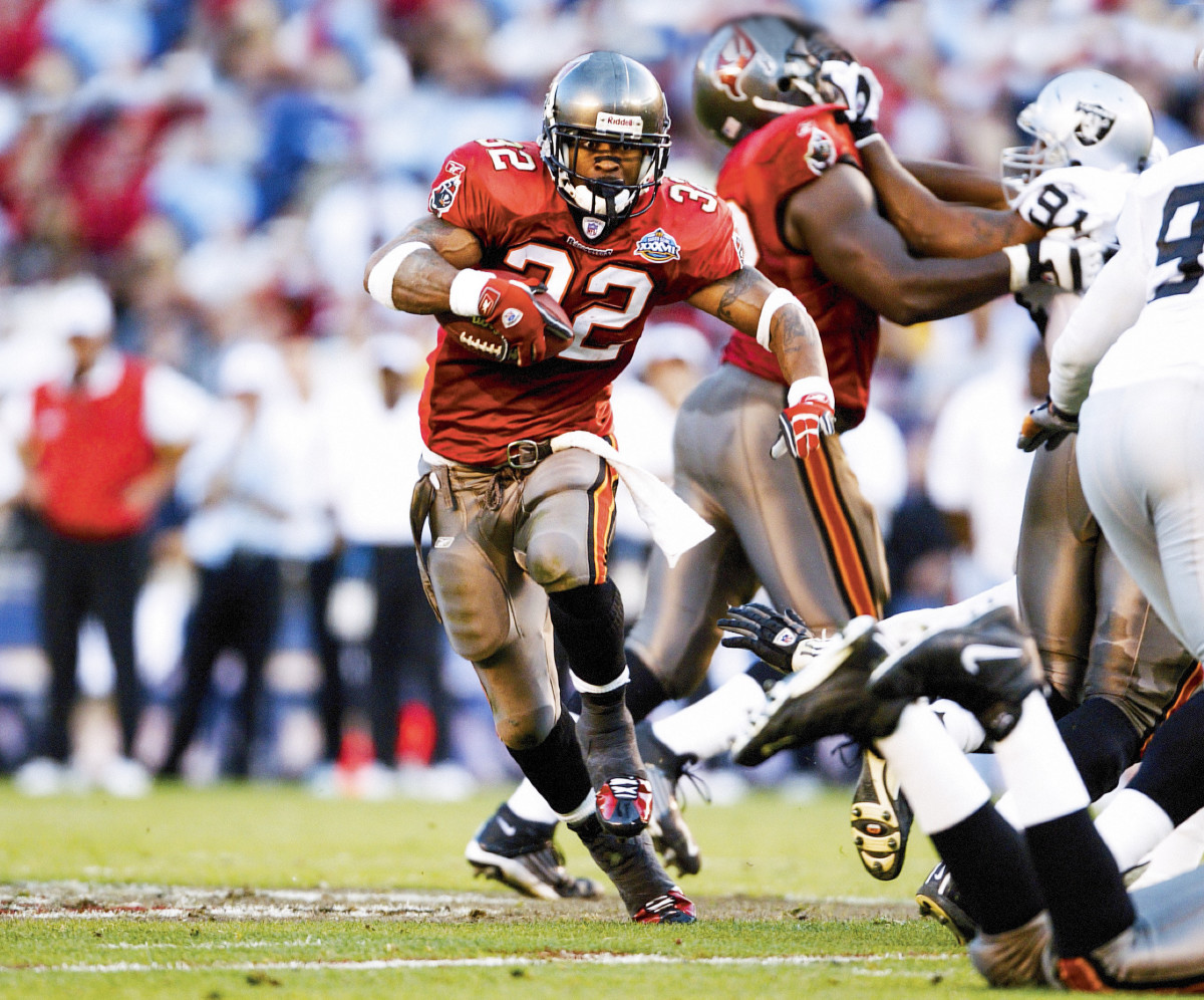 Pittman Sr., ripping off one of his 124 yards in a Super Bowl XXXVII win over the Raiders.