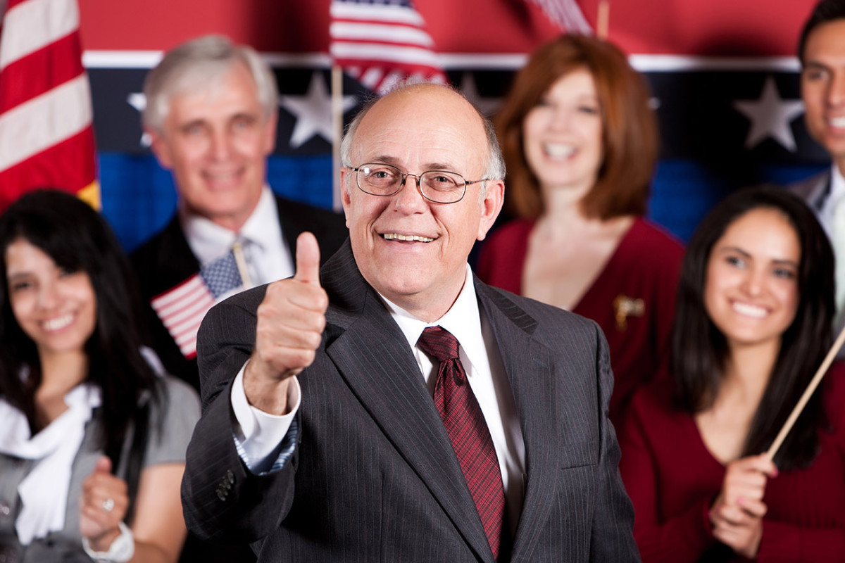 "On behalf of The People, I, stock photo model of 'Mature Male Politician,' hereby approve of this mock draft."