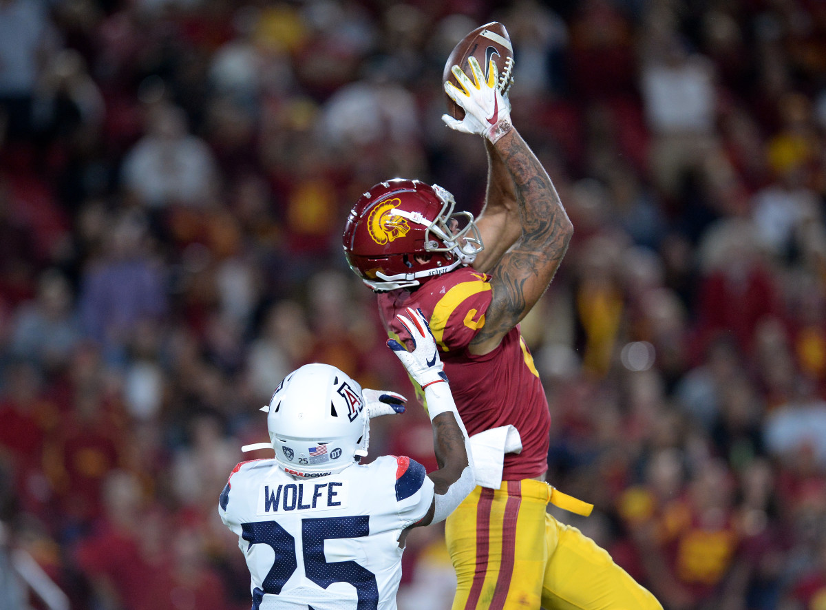 October 19, 2019; Los Angeles, CA, USA; Southern California Trojans wide receiver Michael Pittman Jr. (6) catches a pass against Arizona Wildcats cornerback Bobby Wolfe (25) during the second half at the Los Angeles Memorial Coliseum. Mandatory Credit: Gary A. Vasquez-USA TODAY Sports