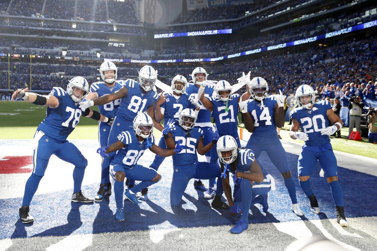 The Indianapolis Colts strike a touchdown pose after a 2019 score at Lucas Oil Stadium.