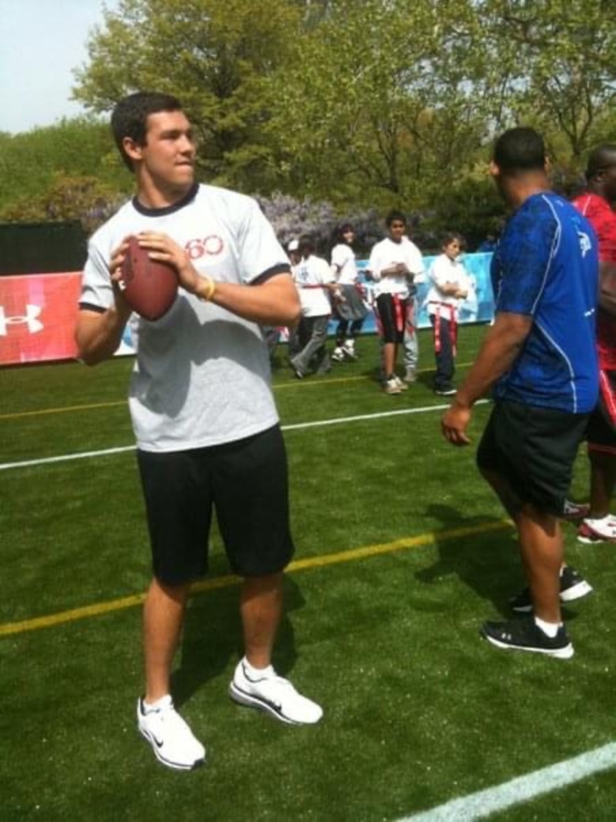 Sam Bradford throws at the NFL Play 60 youth clinic in Central Park.