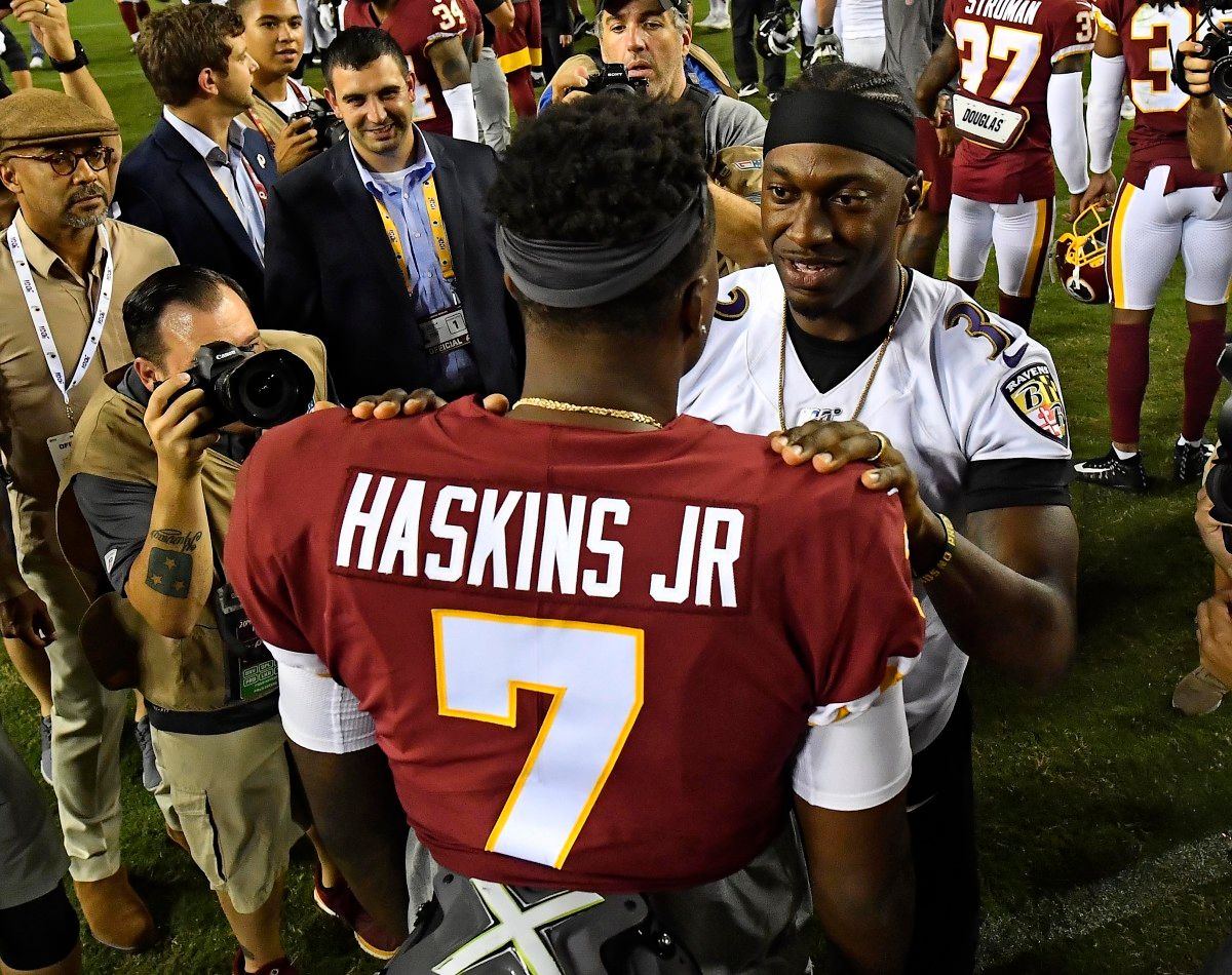Robert Griffin with Dwayne Haskins