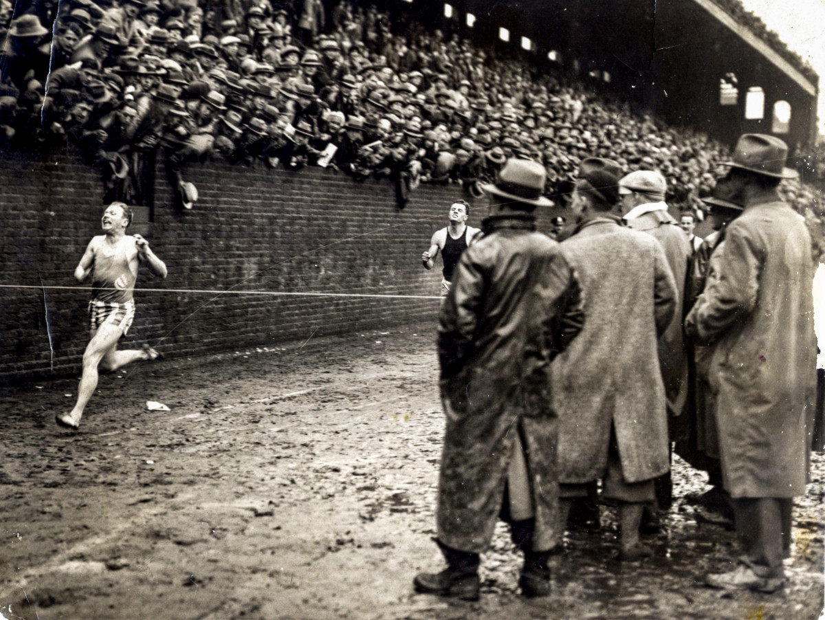 In 1928, Charley Paddock dodged fans who'd fallen onto the track, then he took the 175-yard sprint.