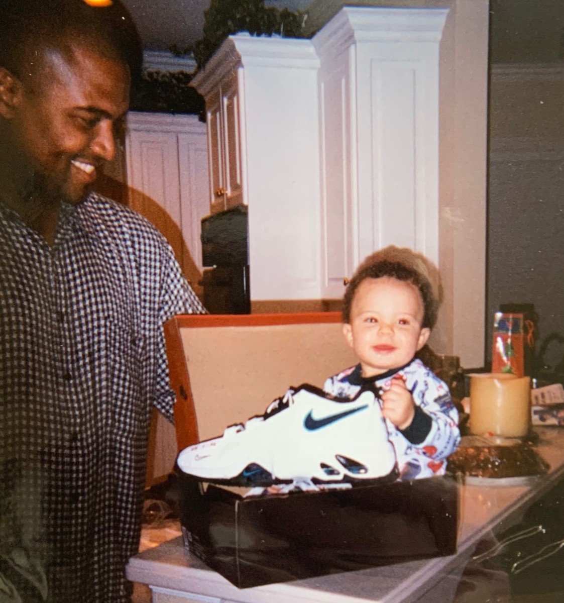 Brycen Hopkins as a baby sits in one of his father's shoe boxes. Brad Hopkins played 13 seasons in the NFL with the Houston Oilers and Tennessee Titans. (Photo courtesy of Hopkins family)