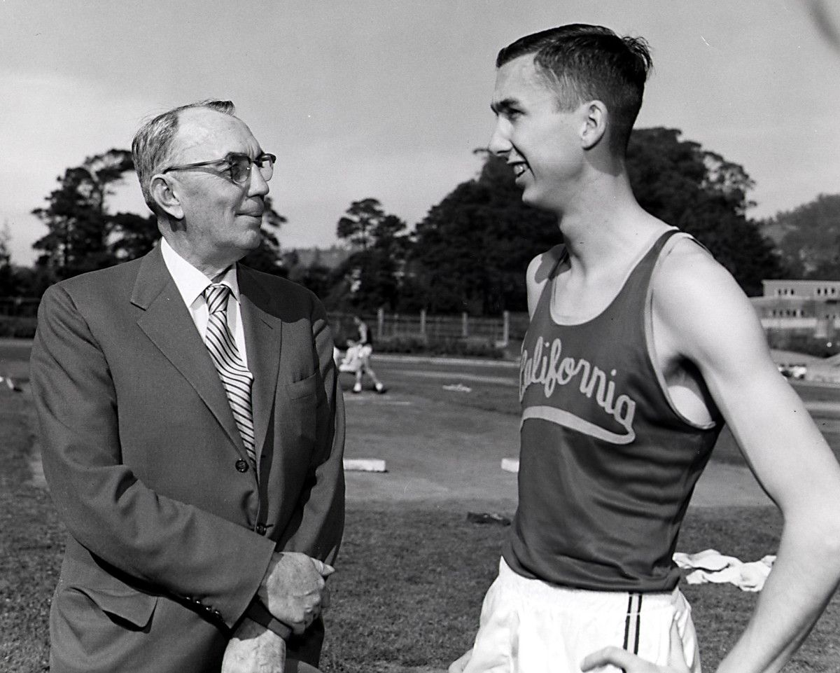 Cal track star Don Bowden visits with his coach, legendary Brutus Hamilton