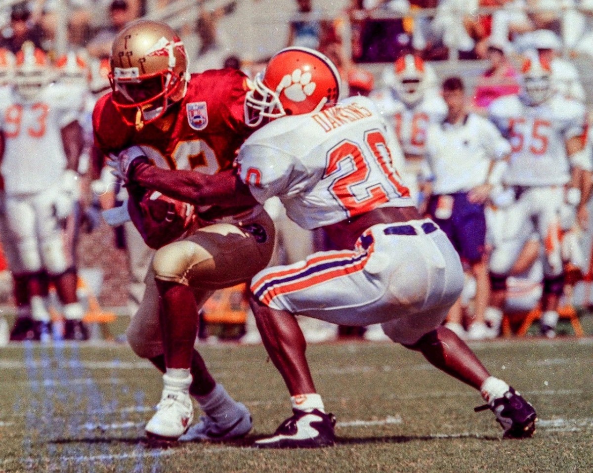 Clemson's Brian Dawkins tackles Florida State's Warrick Dunn in the Tiger's 1994 trip to Tallahassee. 