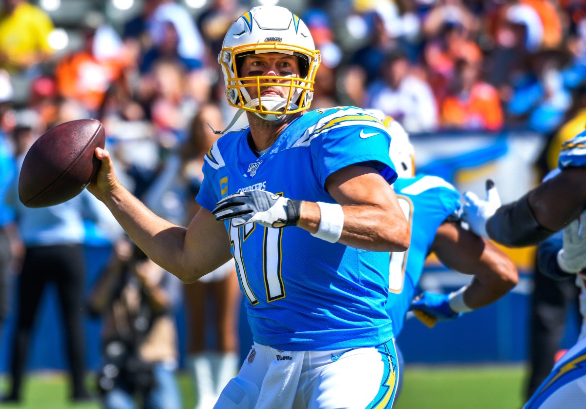 Quarterback Philip Rivers, showing throwing a pass in 2019, must cut down on risky throws with his new team, the Indianapolis Colts. The 38-year-old passer had 20 interceptions last season.