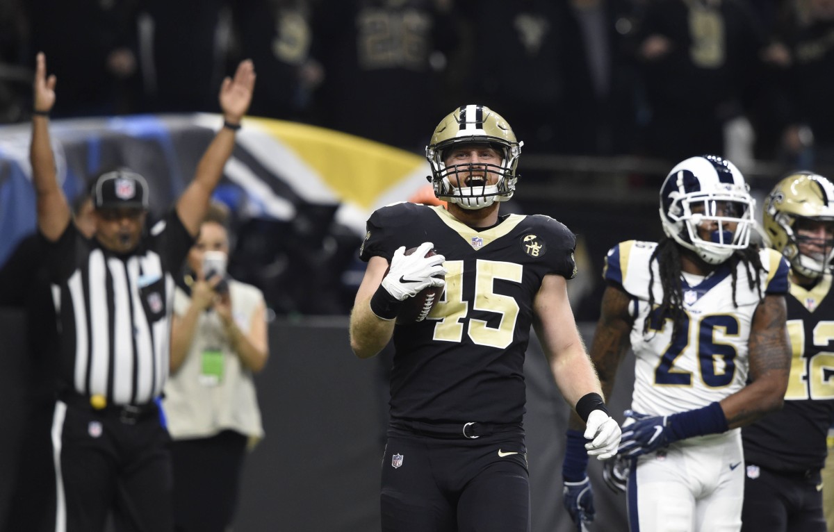Jan 20, 2019; New Orleans, LA, USA; New Orleans Saints tight end Garrett Griffin (45) catches a touchdown pass against the Los Angeles Rams during the first quarter in the NFC Championship game at Mercedes-Benz Superdome. Mandatory Credit: John David Mercer-USA TODAY Sports