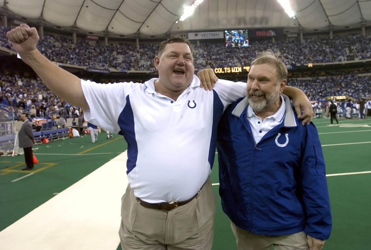 Indianapolis Colts defensive line coach John Teerlinck (left) and offensive line coach Howard Mudd celebrate after a 2005 home playoff win at the RCA Dome. Teerlinck passed away Sunday night.