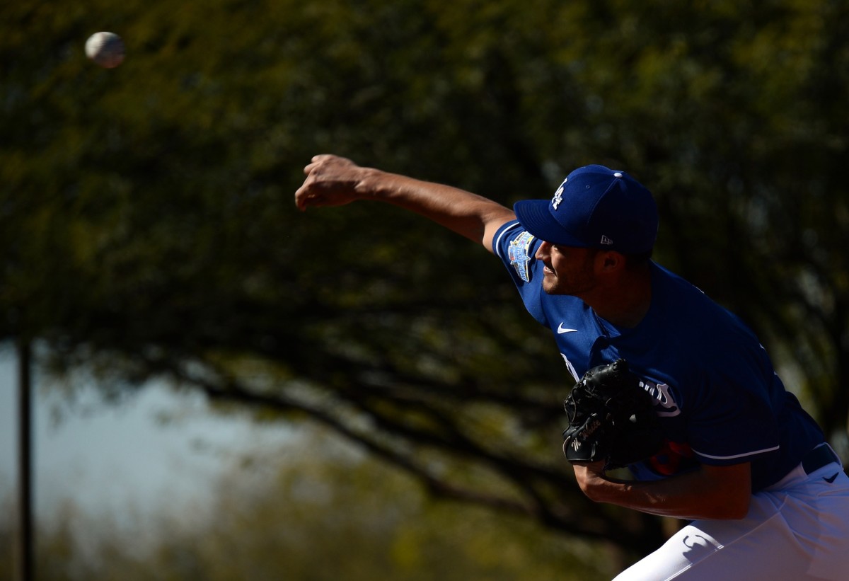 Feb 16, 2020; Glendale, Arizona, USA; Los Angeles Dodgers pitcher Mitchell White (66) throws during a spring training workout at Camelback Ranch. Mandatory Credit: Joe Camporeale-USA TODAY Sports