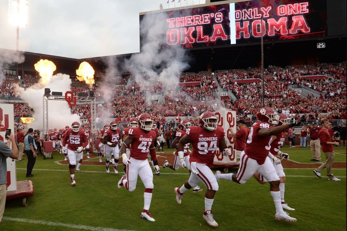 Oklahoma players enter Memorial Stadium before a game.