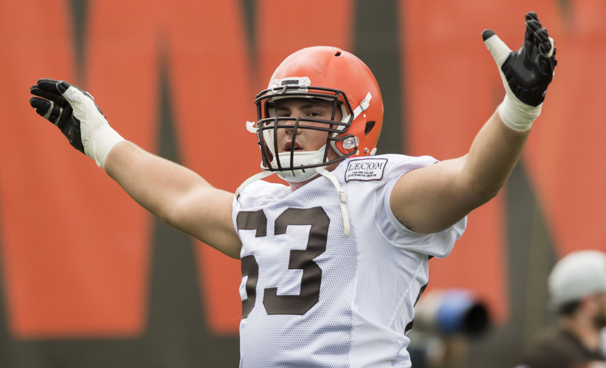 Former Browns offensive guard Austin Corbett stretches during the team's 2018 training camp in Berea. After reaching to draft Corbett that year, the Browns released him three games into the 2019 season.