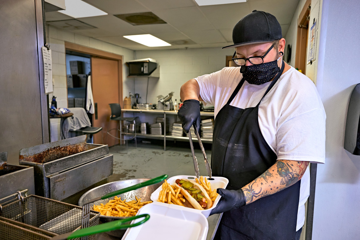The takeout program has helped the Vibes save some jobs, including that of kitchen employee James Dodson.