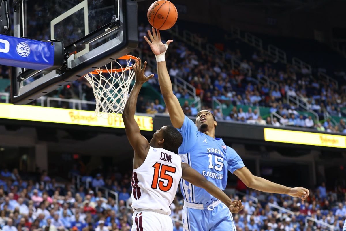 North Carolina Tar Heels forward Garrison Brooks (15) blocks the shot of Virginia Tech Hokies guard Jalen Cone (15)