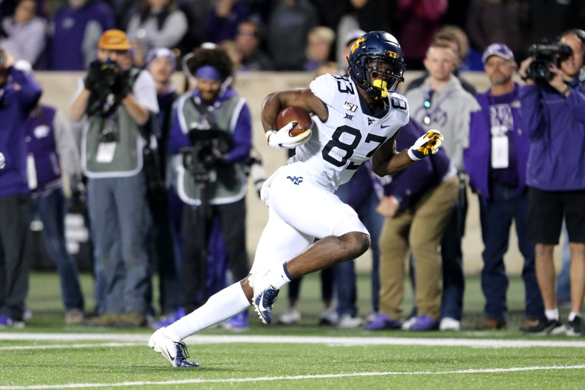 West Virginia Mountaineers wide receiver Bryce Wheaton (83) scores the game-winning touchdown in the fourth quarter of a game against the Kansas State Wildcats at Bill Snyder Family Stadium.