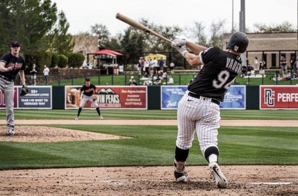 Andrew Vaughn takes a spring training cut vs. the Cleveland Indians