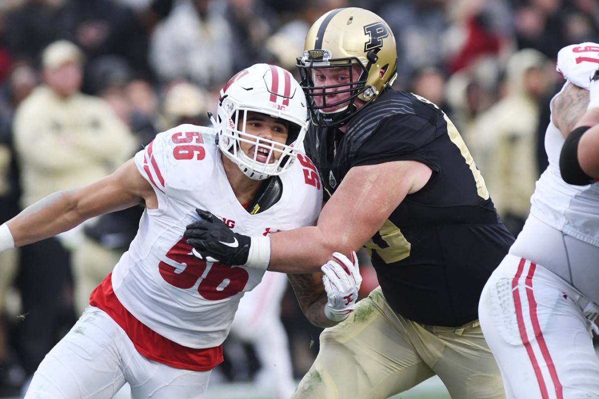 Nov 17, 2018; West Lafayette, IN, USA; Purdue tackle Eric Swingler (60) blocks against Wisconsin Badgers linebacker Zach Baun (56) in the first half at Ross-Ade Stadium. Mandatory Credit: Thomas J. Russo-USA TODAY Sports