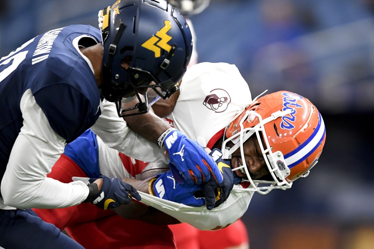 Jan 18, 2020; St. Petersburg, Florida, USA; Team East wide receiver Freddie Swain (16) makes a reception as Team West cornerback Keith Washington II (28) defends during the second quarter at Tropicana Field. Mandatory Credit: Douglas DeFelice-USA TODAY Sports