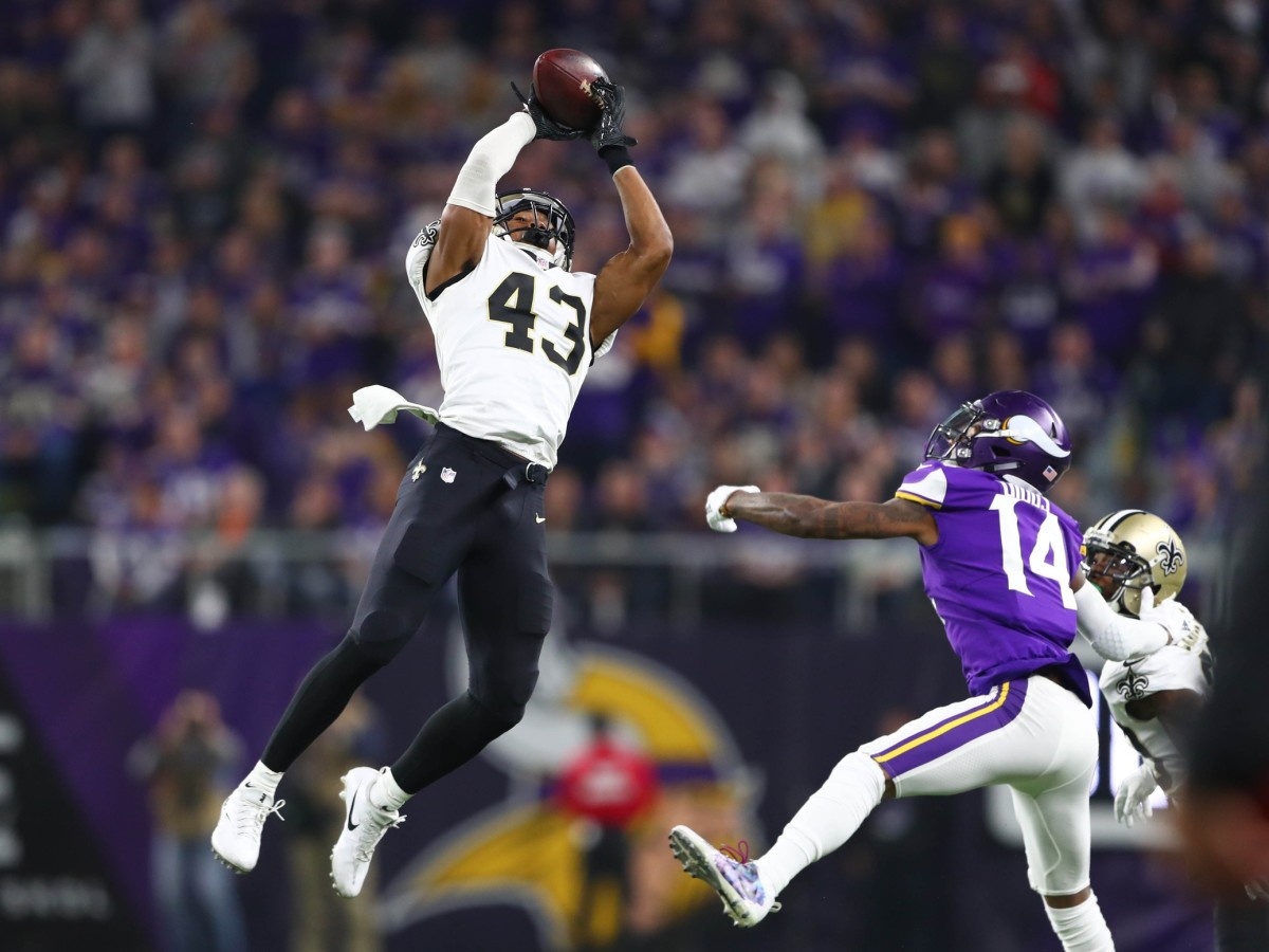 Jan 14, 2018; Minneapolis, MN, USA; New Orleans Saints free safety Marcus Williams (43) intercepts a pass intended for Minnesota Vikings wide receiver Stefon Diggs (14) in the fourth quarter of the NFC Divisional Playoff football game at U.S. Bank Stadium. Mandatory Credit: Mark J. Rebilas-USA TODAY Sports