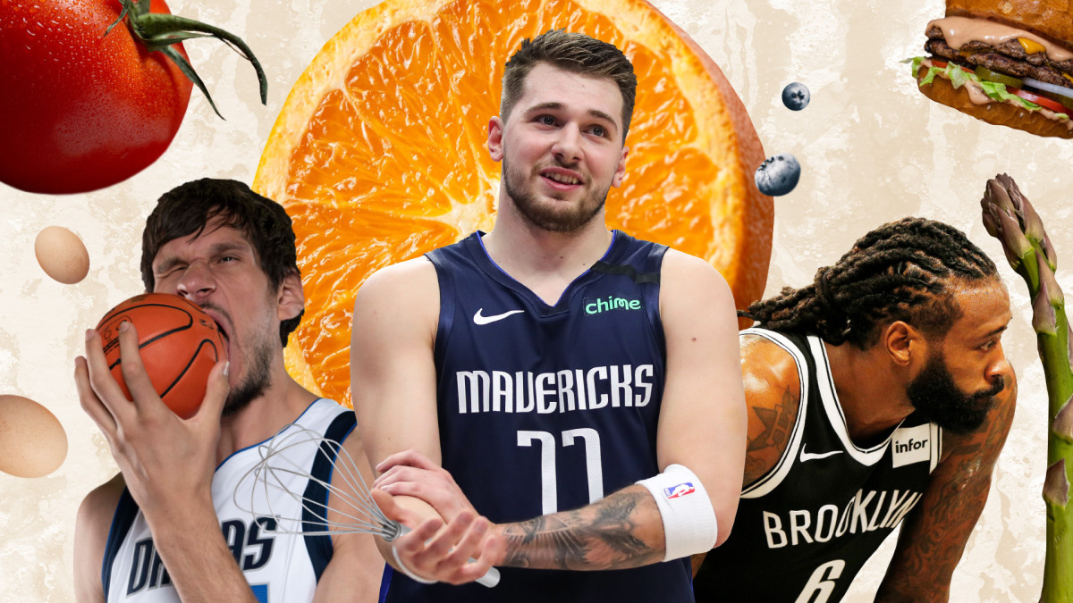 Boban Marjoanovic, Luka Doncic and DeAndre Jordan surrounded by food