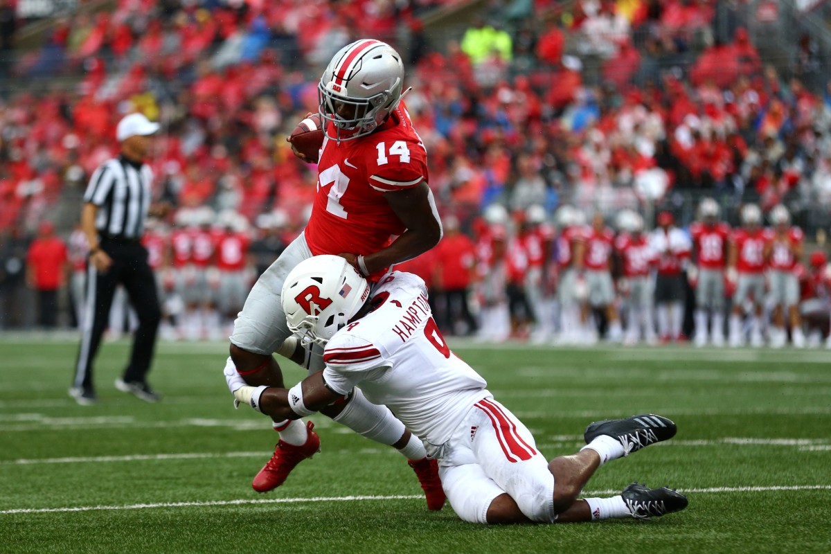 Sep 8, 2018; Columbus, OH, USA; Ohio State Buckeyes wide receiver K.J. Hill (14) makes a catch against Rutgers Scarlet Knights defensive back Saquan Hampton (9) in the first half at Ohio Stadium. Mandatory Credit: Aaron Doster-USA TODAY Sports