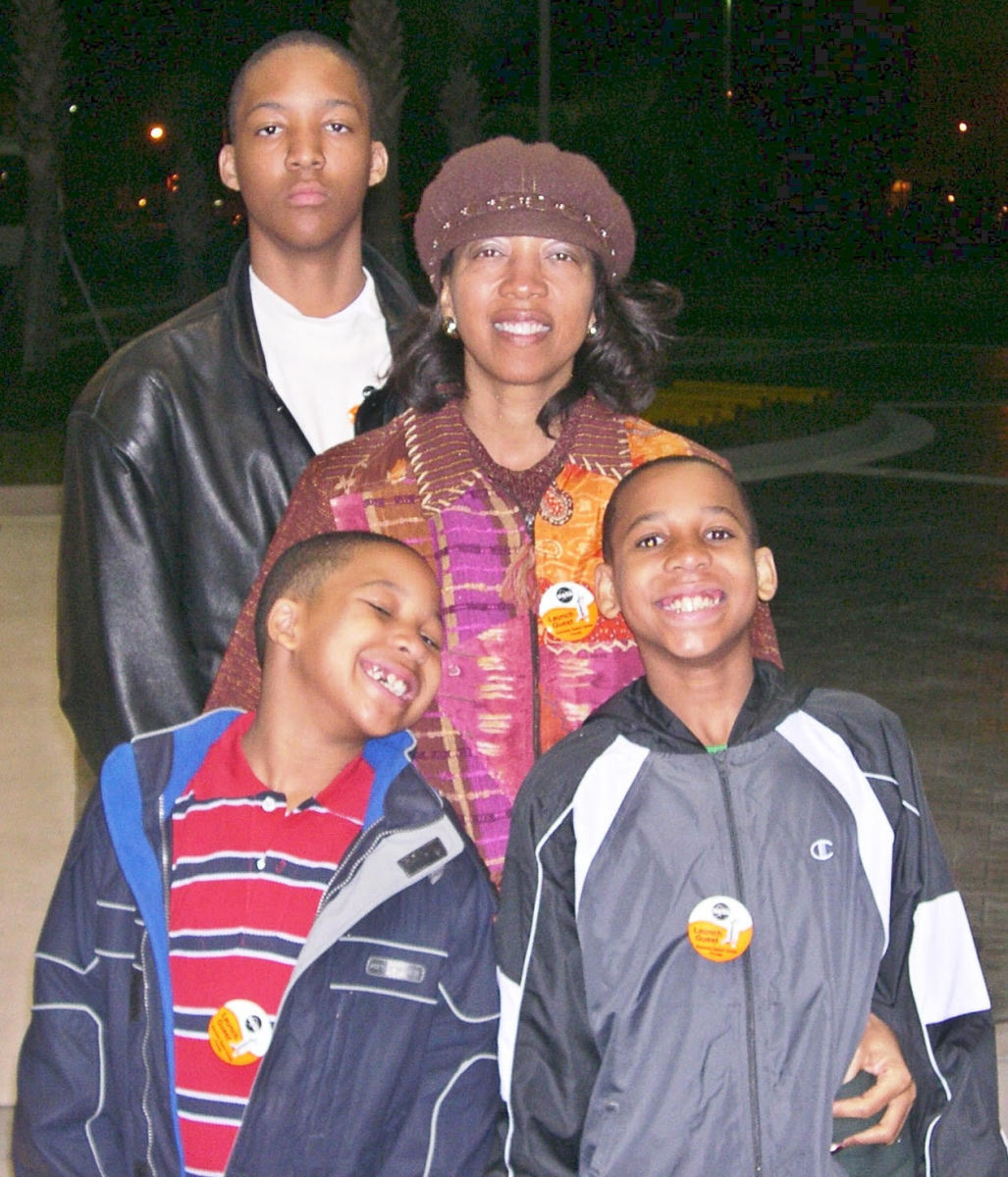 Grant Williams with his mother and brothers