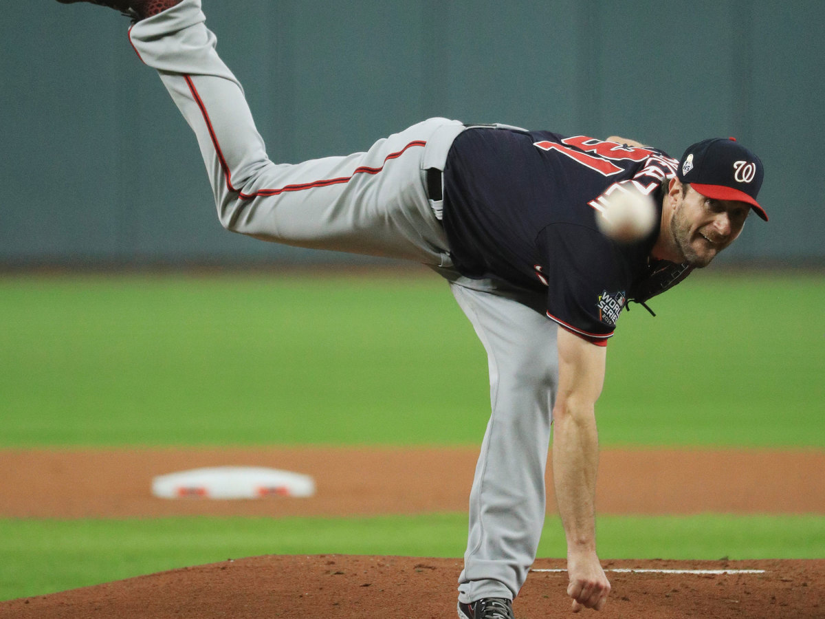 Max Scherzer unfurls a pitch in the 2019 World Series.