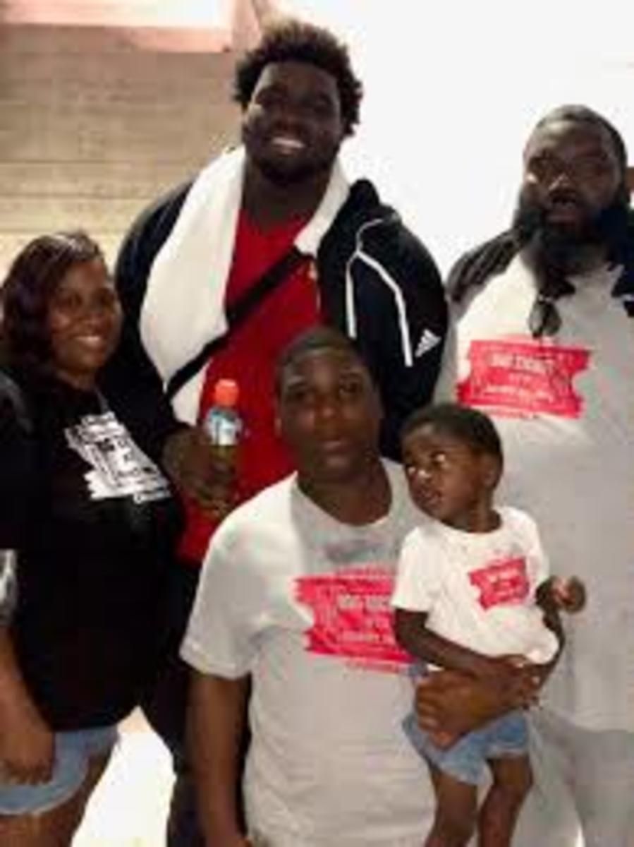 Semone Becton with Mekhi and husband Jerome. Mike is holding Mason in the front row.