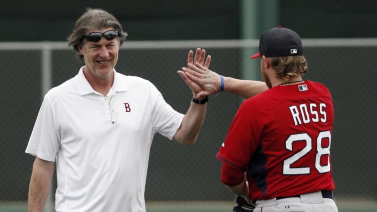 Boston Red Sox mental skills coach Bob Tewksbury, left, greets starting pitcher Robbie Ross Jr.