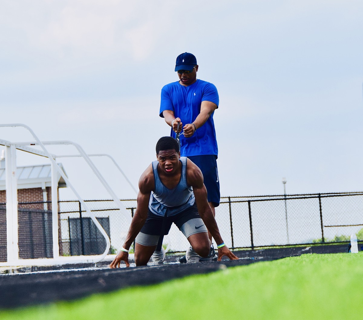 Jaden and his dad, Jeroid, during their track workout