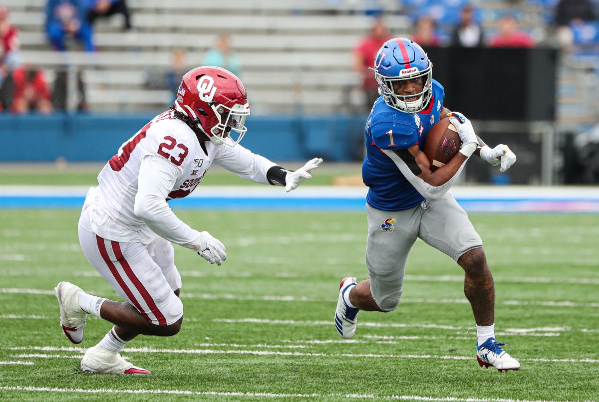 DaShaun White chases KU's Pooka Williams.