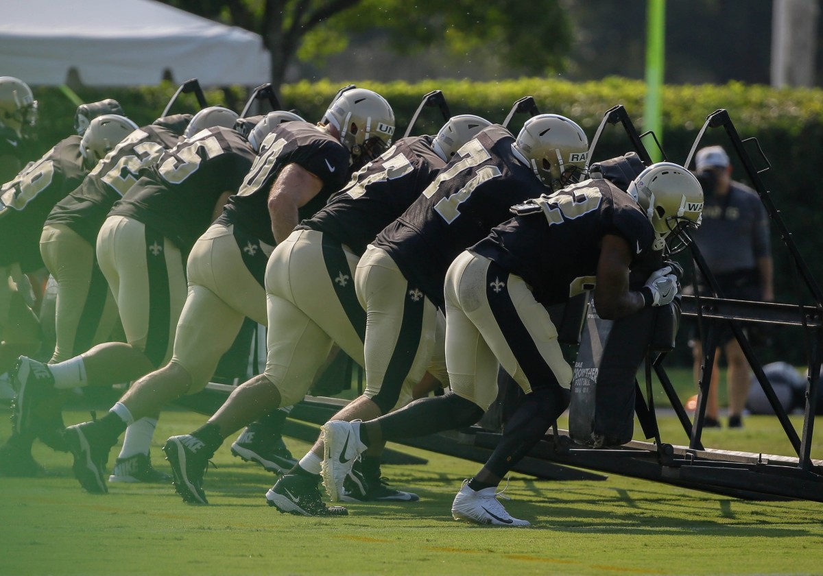 Jul 28, 2018; Metairie, LA, USA; New Orleans Saints offensive line runs a sled drill during training camp at New Orleans Saints Training Facility. Mandatory Credit: Derick E. Hingle-USA TODAY 