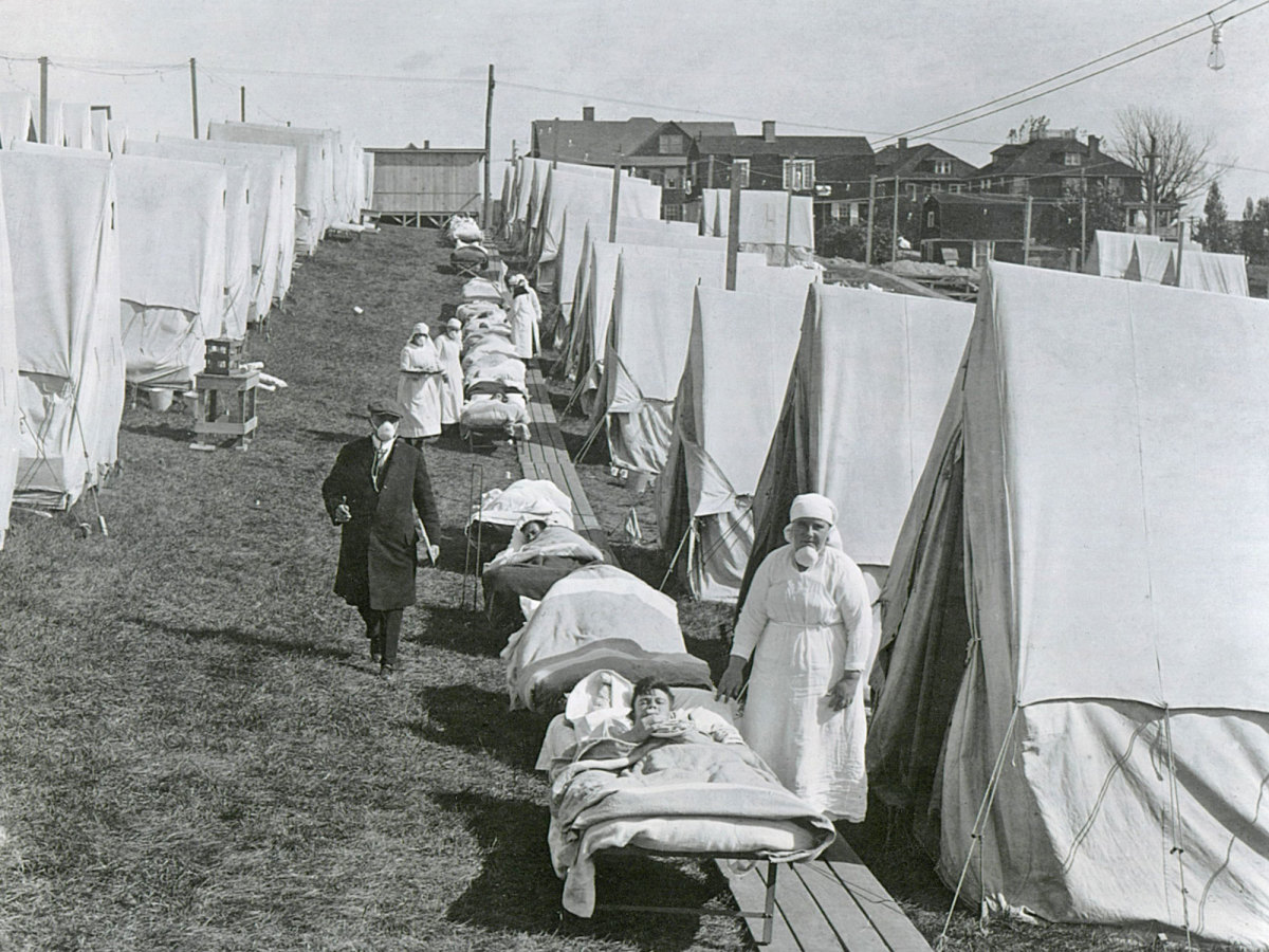 A line of medical tents treat flu patients.