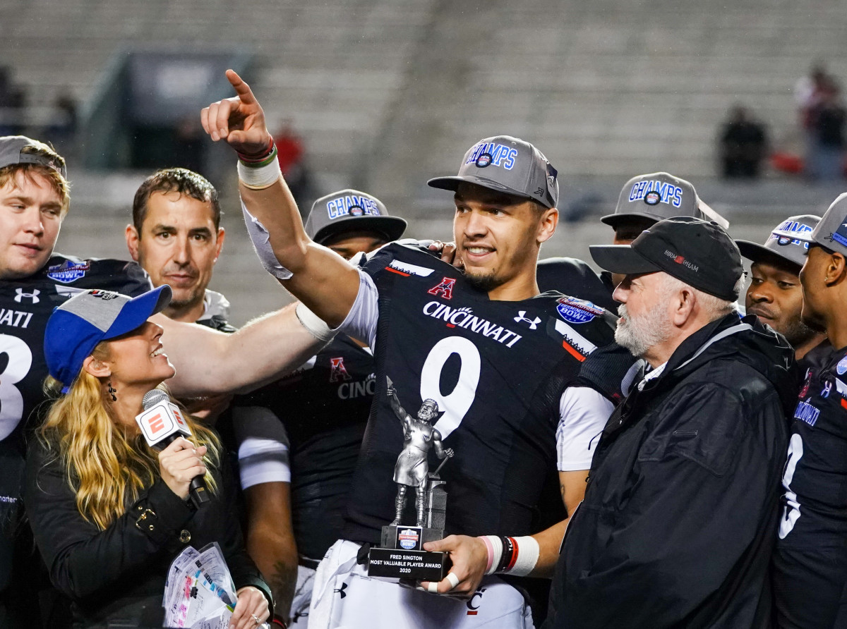 Cincinnati Bearcats quarterback Desmond Ridder (9) reacts after winning the MVP award of the 2019 Birmingham Bowl after defeating the Boston College Eagles at Legion Field.