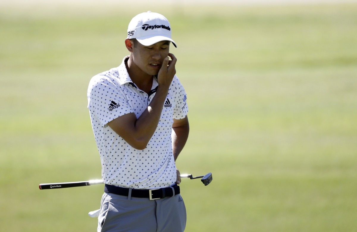 Collin Morikawa reacts after missing his putt on the 18th hole Sunday