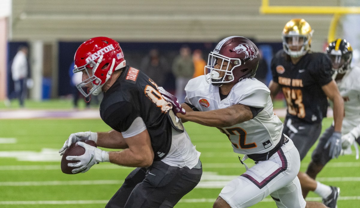 Jan 23, 2020; Mobile, Alabama, USA; North tight end Adam Trautman of Dayton (84) makes a catch past North safety Jeremy Chinn of Southern Illinois (22) during Senior Bowl practice at University of South Alabama s Jaguar Football Practice Facility. Mandatory Credit: Vasha Hunt-USA TODAY Sports