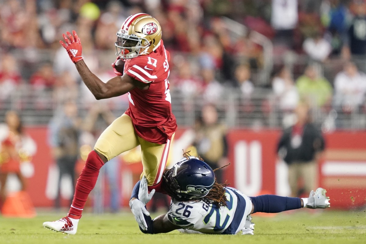 November 11, 2019; Santa Clara, CA, USA; San Francisco 49ers wide receiver Emmanuel Sanders (17) is tackled by Seattle Seahawks cornerback Shaquill Griffin (26) during the first quarter at Levi's Stadium. Mandatory Credit: Kyle Terada-USA TODAY Sports