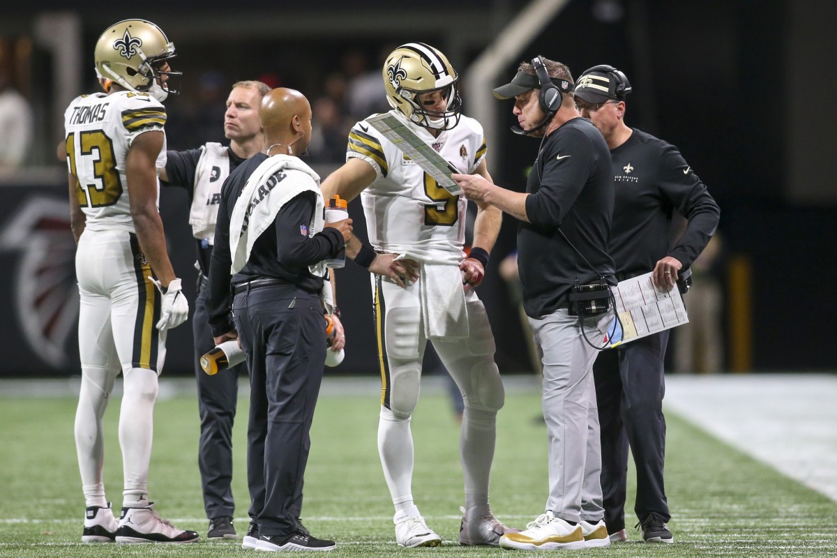 Nov 28, 2019; Atlanta, GA, USA; New Orleans Saints quarterback Drew Brees (9) talks to head coach Sean Payton against the Atlanta Falcons in the second half at Mercedes-Benz Stadium. Mandatory Credit: Brett Davis-USA TODAY Sports