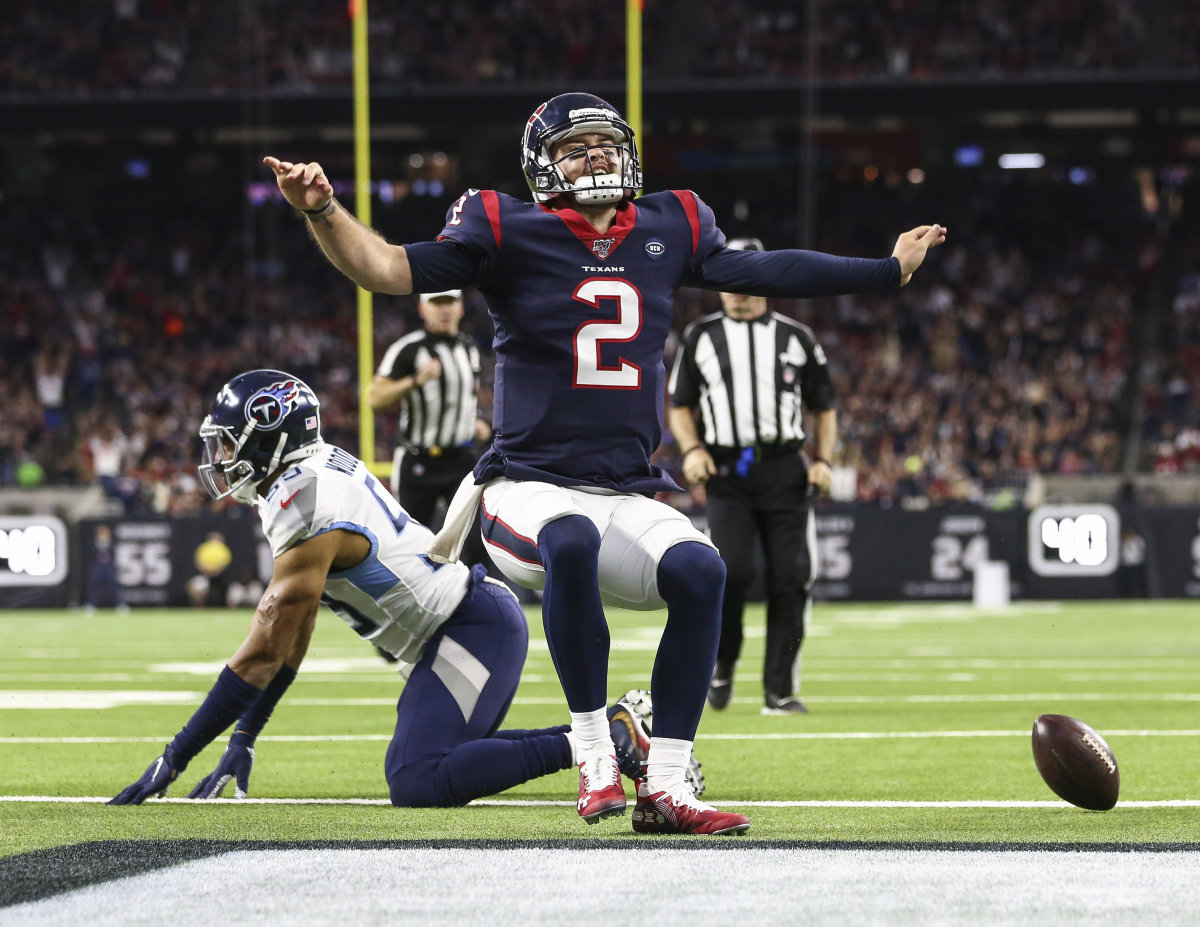 Texans backup quarterback A.J. McCarron reacts after rushing for a touchdown during the third quarter against the Titans in 2019.