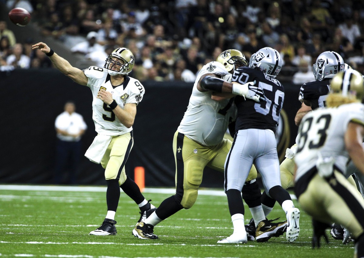 Sep 11, 2016; New Orleans, LA, USA; New Orleans Saints quarterback Drew Brees (9) throws a pass against the Oakland Raiders during the second quarter of a game at the Mercedes-Benz Superdome. Mandatory Credit: Derick E. Hingle-USA TODAY Sports