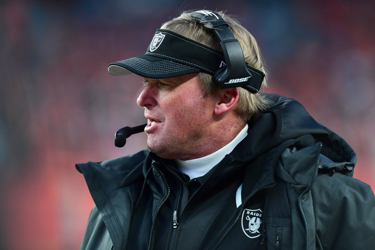 Dec 29, 2019; Denver, Colorado, USA; Oakland Raiders head coach Jon Gruden calls out In the second half against the Denver Broncos at Empower Field at Mile High. Mandatory Credit: Ron Chenoy-USA TODAY