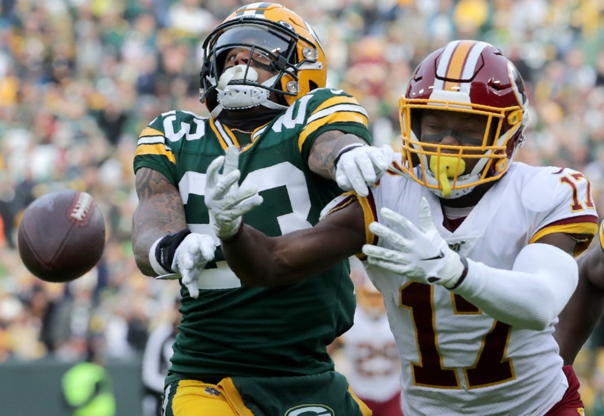 Green Bay Packers cornerback Jaire Alexander (23) breaks up a pass intended for Washington Redskins wide receiver Terry McLaurin (17) in the end zone during the second quarter of their football game Sunday, Dec. 8, 2019, at Lambeau Field in Green Bay, Wis. Apc Packers Vs Redskins 0455 120819 Wag