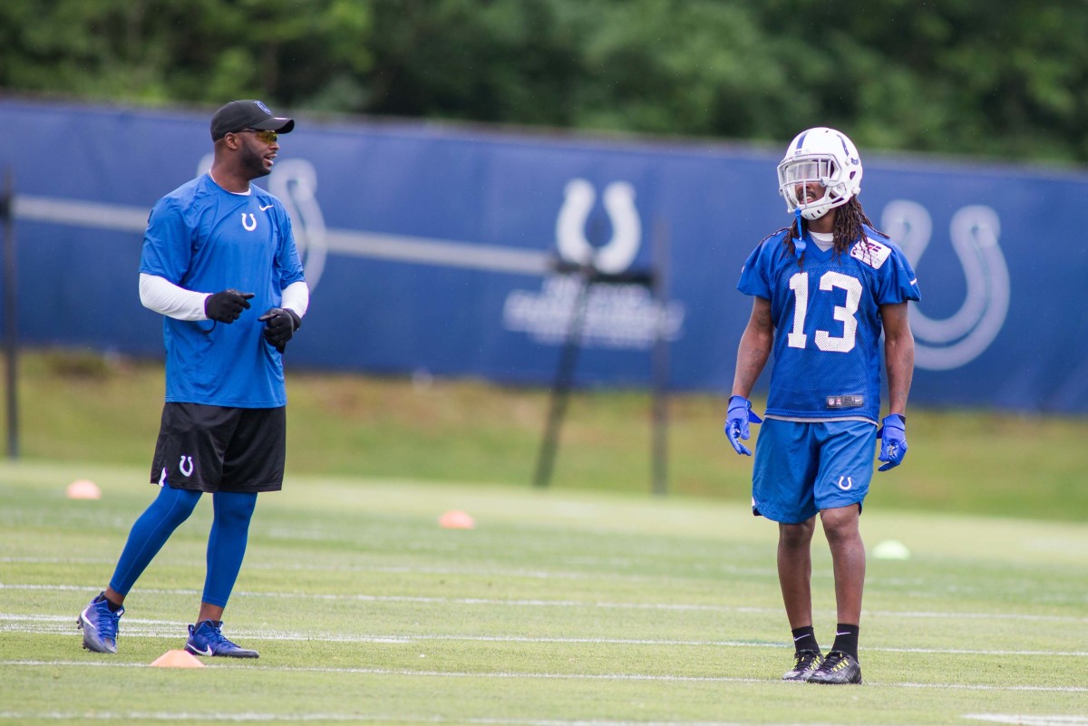 When Indianapolis Colts wide receiver T.Y. Hilton (13) entered the NFL in 2012, he had veteran pass-catcher Reggie Wayne (left) as a mentor.