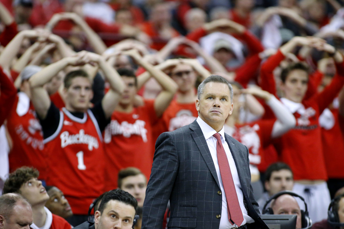 Ohio State Head Coach Chris Holtmann standing in front of Buckeyes student-section