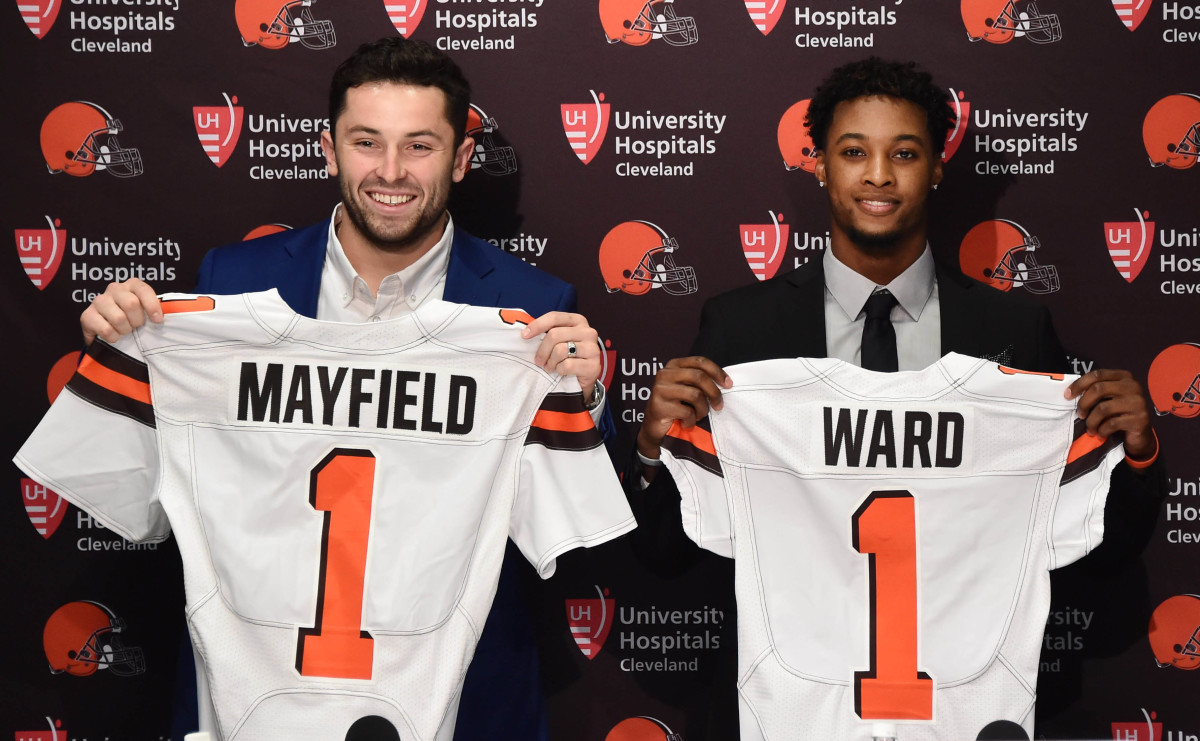Browns first-round picks Baker Mayfield (left) and Denzel Ward show off Browns jerseys during a press conference after the 2018 NFL Draft. That year marked the 13th time Cleveland had multiple first-round picks in the same draft.