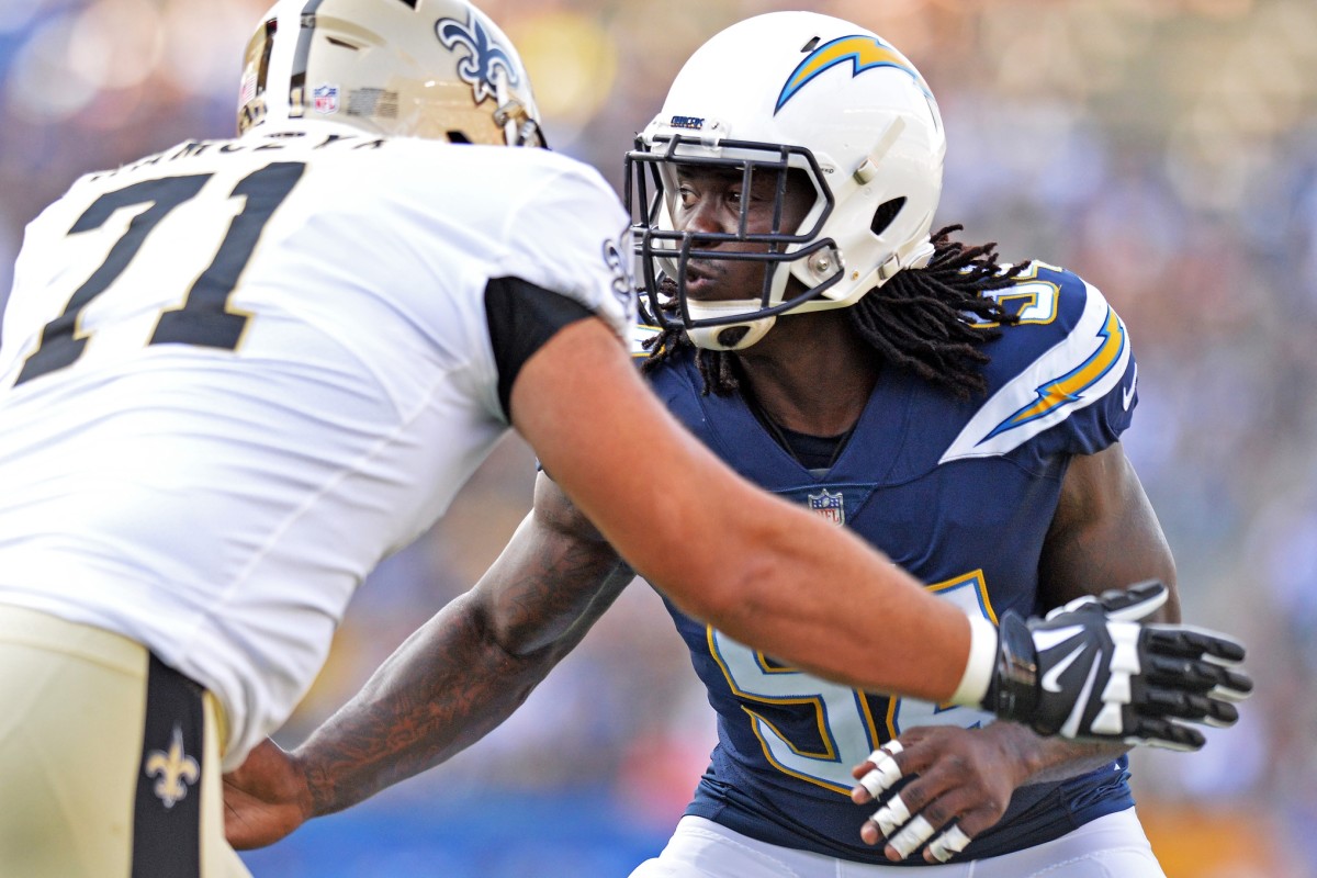 Aug 25, 2018; Carson, CA, USA; Los Angeles Chargers defensive end Melvin Ingram (54) works against New Orleans Saints offensive tackle Ryan Ramczyk (71) during the first quarter at StubHub Center. Mandatory Credit: Jake Roth-USA TODAY Sports