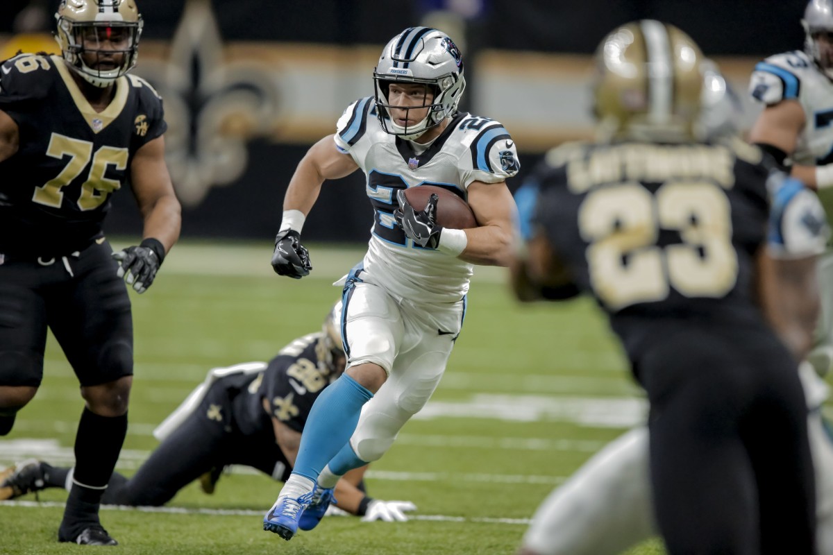 Dec 30, 2018; New Orleans, LA, USA; Carolina Panthers running back Christian McCaffrey (22) runs against the New Orleans Saints during the first quarter at the Mercedes-Benz Superdome. Mandatory Credit: Derick E. Hingle-USA TODAY Sports