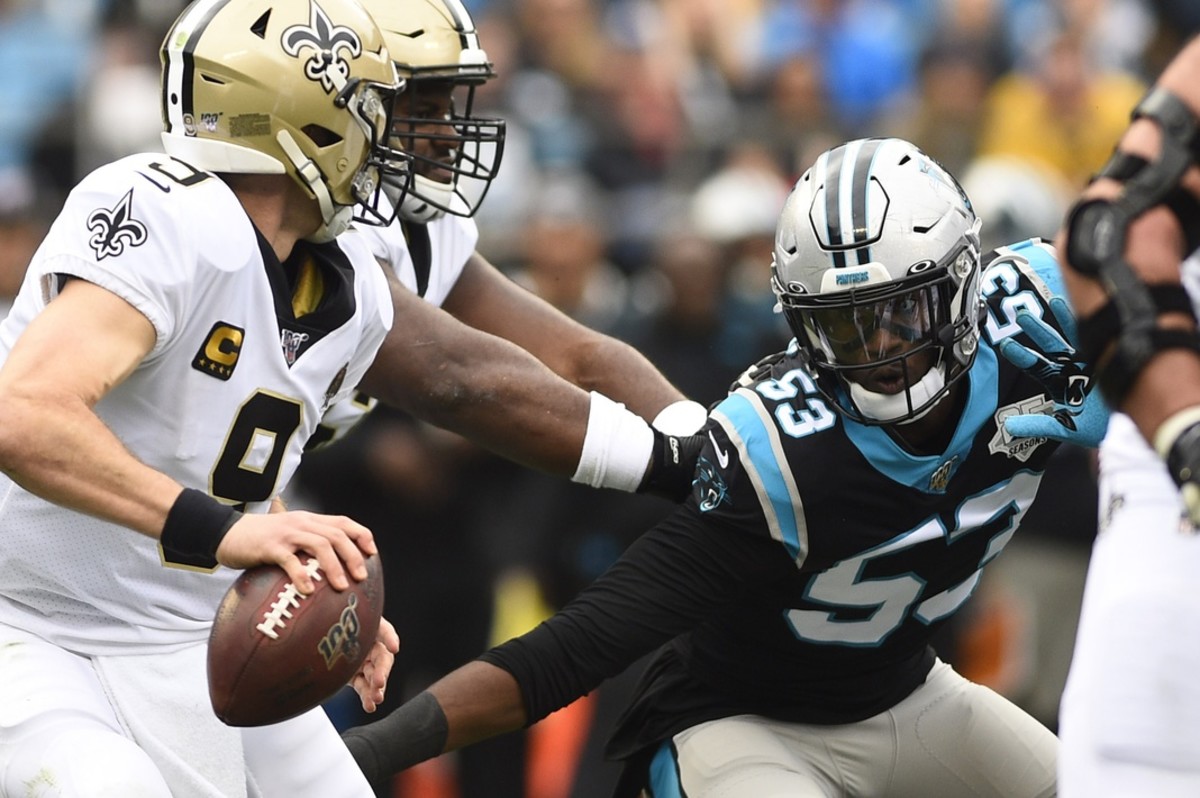 Dec 29, 2019; Charlotte, North Carolina, USA; New Orleans Saints quarterback Drew Brees (9) with the ball as Carolina Panthers linebacker Brian Burns (53) pressures in the first quarter at Bank of America Stadium. Mandatory Credit: Bob Donnan-USA TODAY Sports