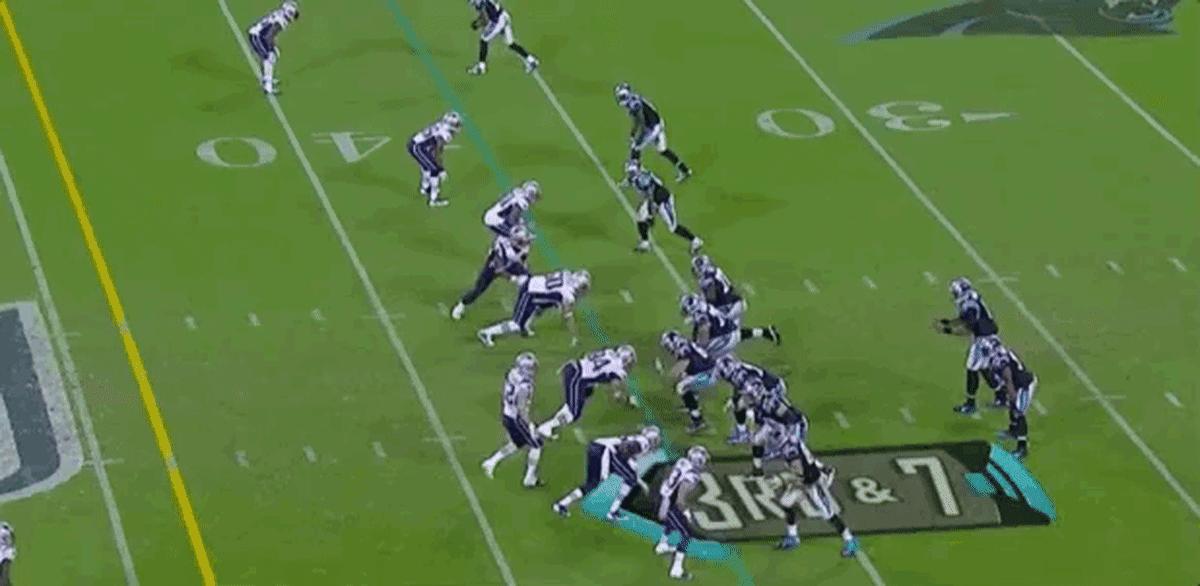 Newton evades tacklers and causes every Patriots' fan to smash their television on this play in 2013.